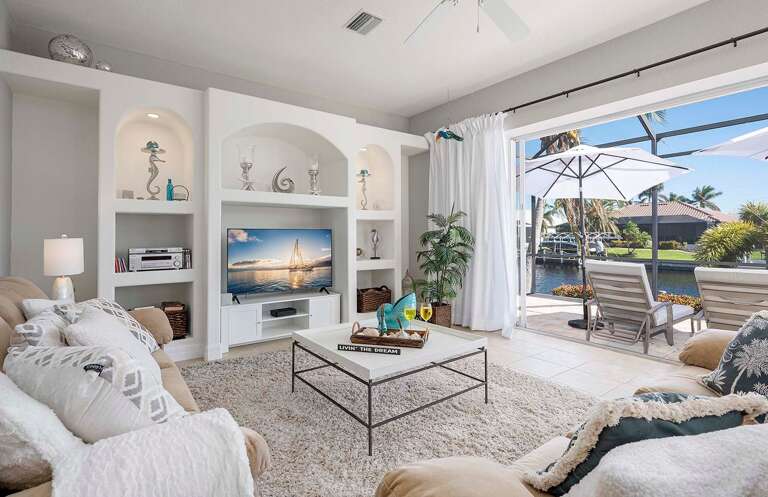 Living Room with Amazing Views of the Canal and Patio