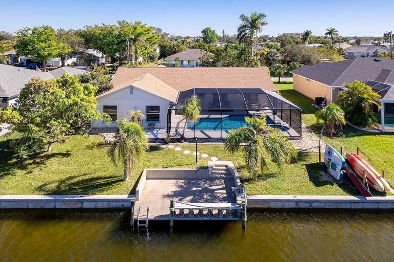 Aerial View of Turtle Cay with Boat Dock and Kayak/Paddle Boat