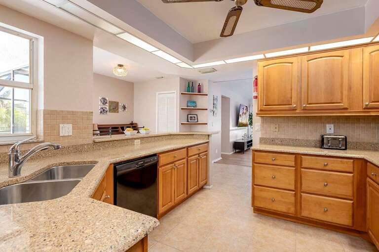 Large Kitchen with Views of the Living Room and Views of the Pool