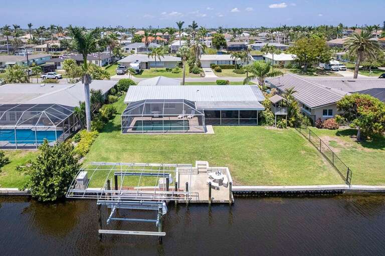 Bird Eye View of Villa Del Aqua with Boat Dock and Lift