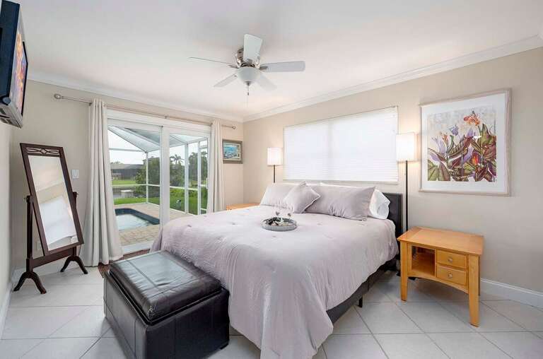 Main Bedroom with King Bed and Patio/Pool Access