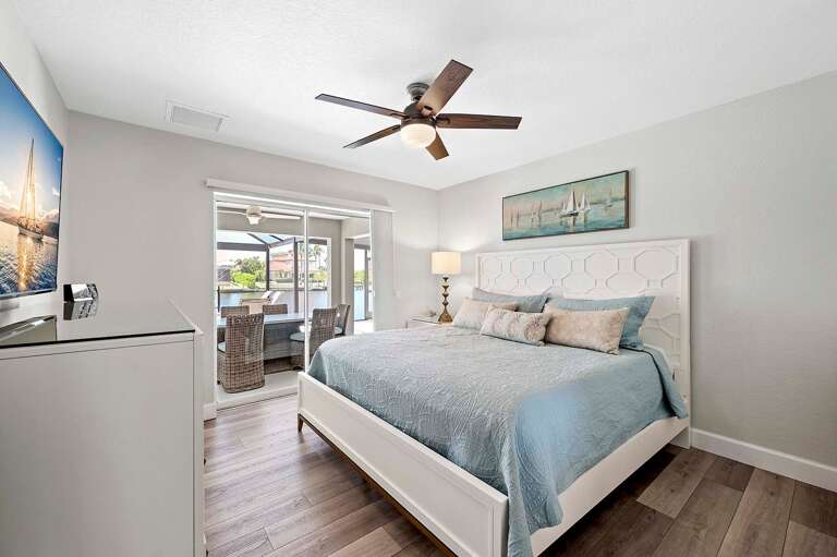 King Bedroom Suite with Access to Lanai and Pool