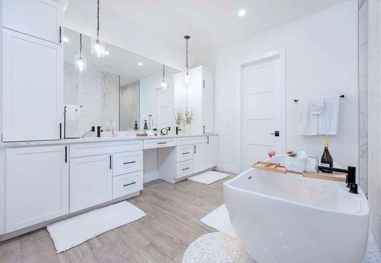Main Bathroom with Walk Through Shower, Soaking Tub and Dual Sinks