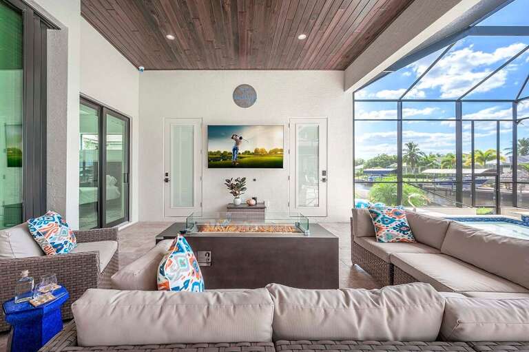 Outdoor Lounge with Fire Pit and Flat Panel TV