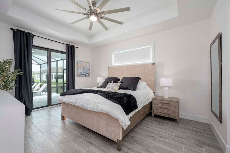 Main Bedroom with Pool Access and King Bed
