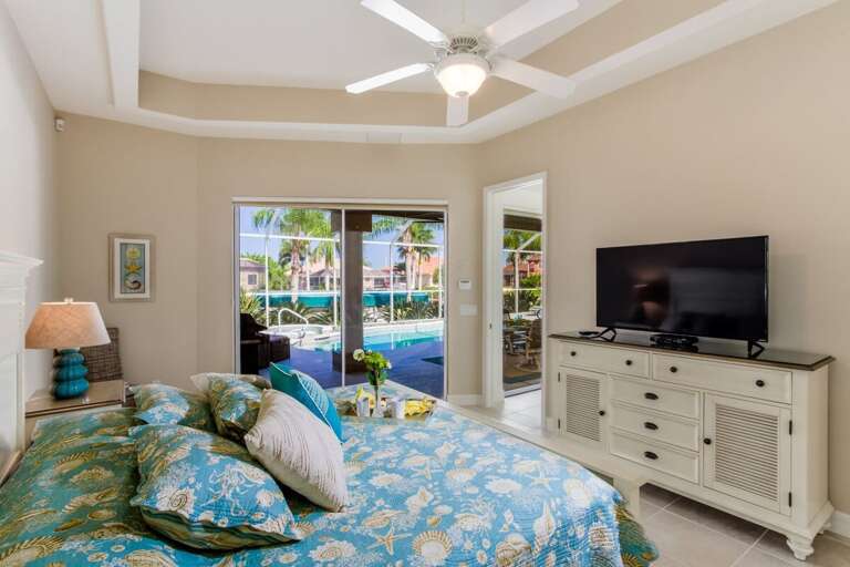 Primary Bedroom with King Size Bed and Access to the Lanai