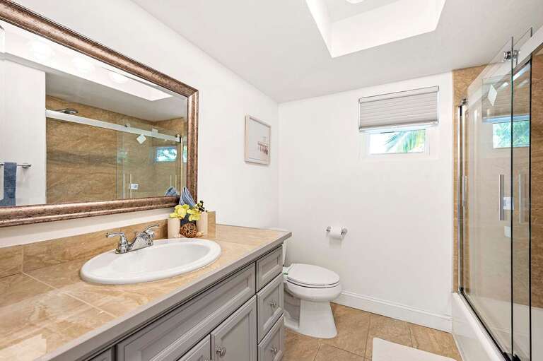 Hallway Bathroom with Shower Tub Combo and Sink
