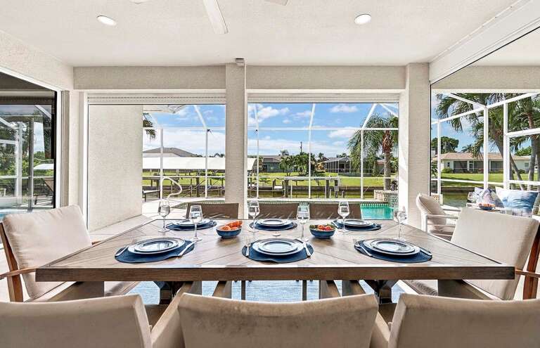 Outdoor Covered Lanai with Southern Views of the Canal