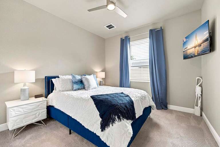 Queen Bedroom with Garden Views and TV