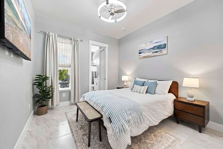 Queen Bedroom with Views and Access to Lanai and En-Suite Pool Bathroom