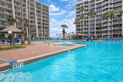 * Heated Pool * Sleeps Many Beachfront Resort