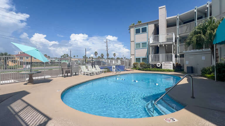Vacation Rental: Poolside Picture, Blue Water Beneath Balconies