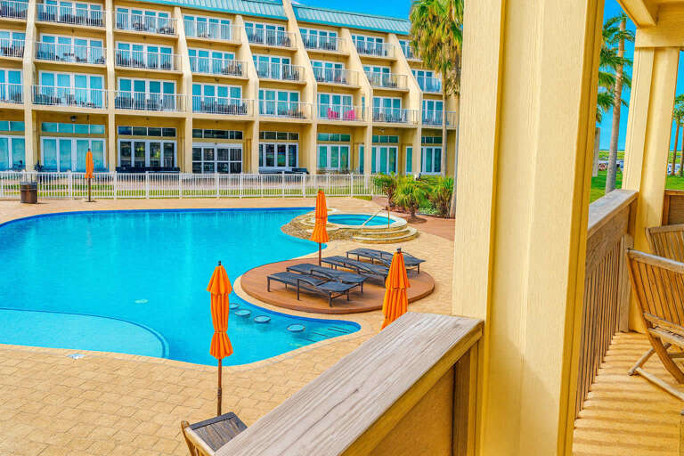 Poolside Paradise With Patio And Palm Trees