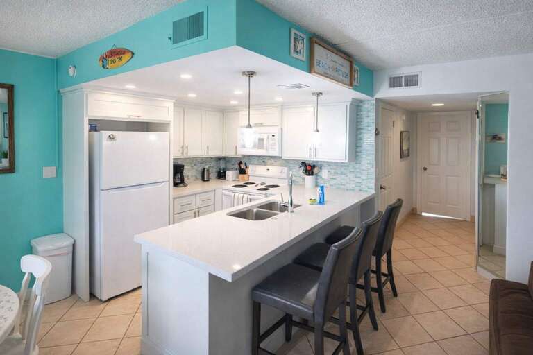 Bright Kitchen, Barstools, Turquoise Walls, Tiled Floor