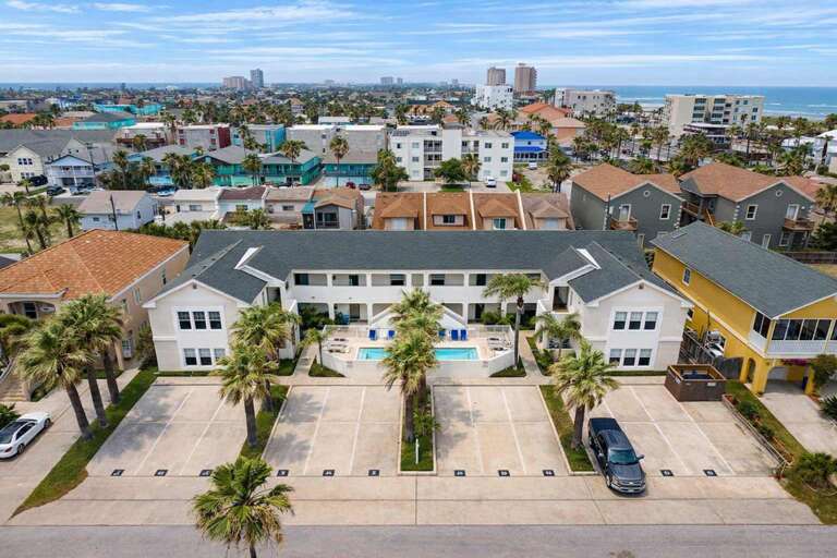 Beachside Vacation Rental With Pool, Palm-lined Pathways, And Ocean Backdrop