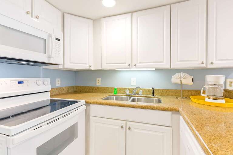 Compact Kitchen Corner With Cabinets, Counter, Coffee Maker