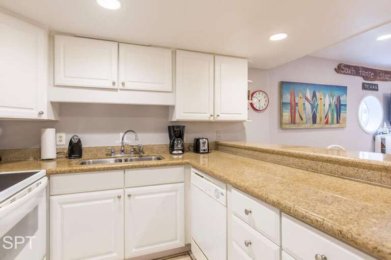 White Cabinets, Granite Counter, Kitchen Setting