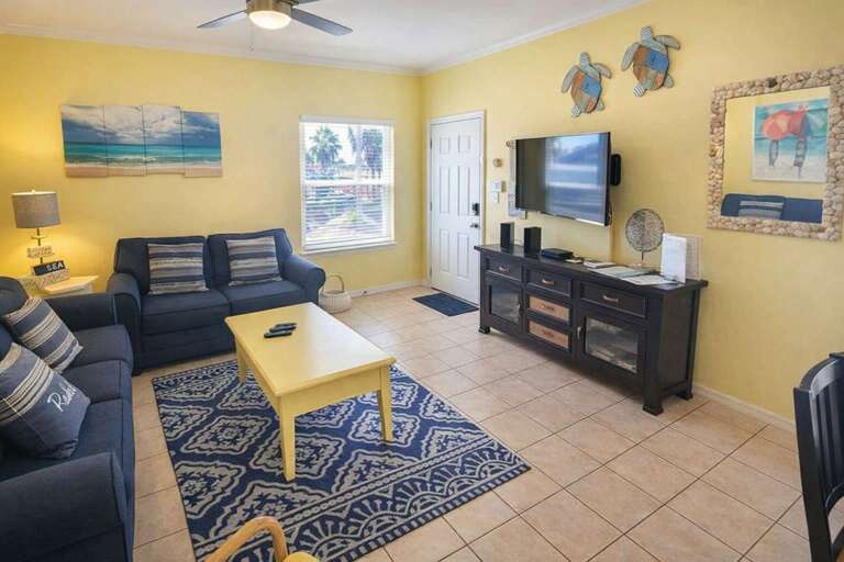 Sunny Sitting Space, Striped Sofas, Sea-themed Decor