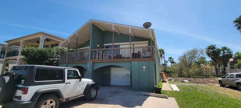 Green-built Balcony Building Beneath Blue Sky