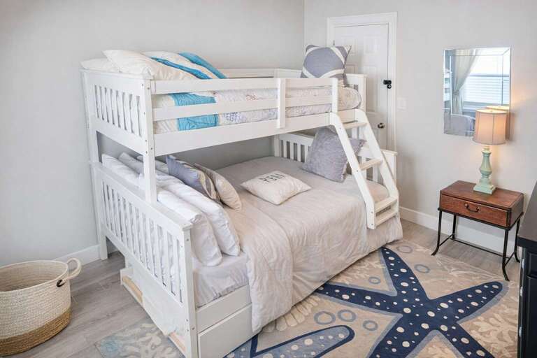 Bunk Bed, Starfish Rug, Soft Pillows, Bedside Lamp