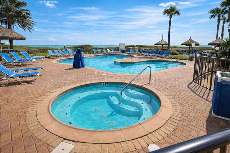 Sunlit Scene With Shimmering Pools, Swaying Palms, And Scattered Loungers