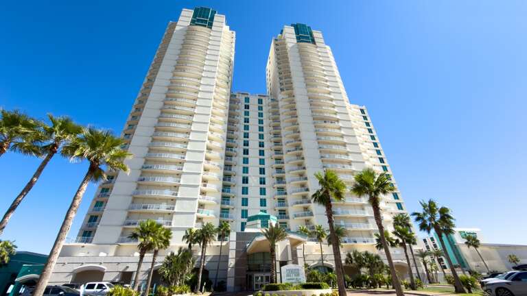 Tall Twin Towers, Palm Trees, Blue Sky