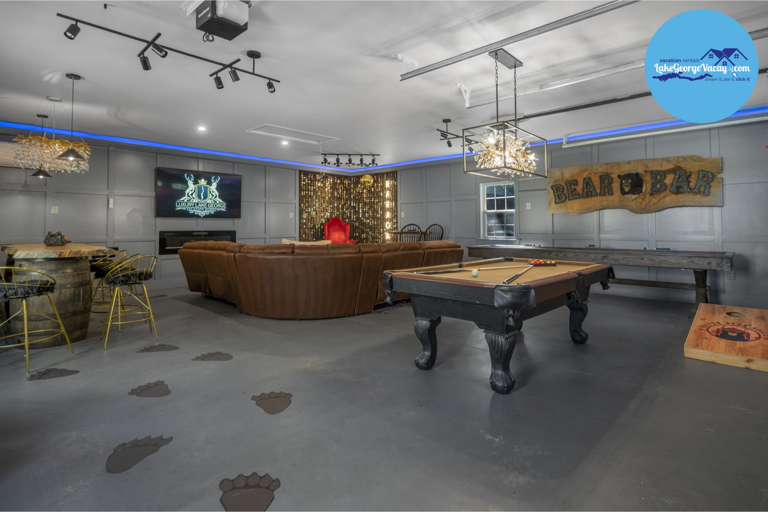 Game Room With Pool Table, Bar, And Seating