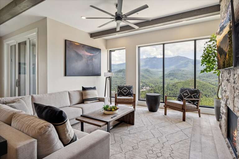 Spacious Living Space With Sweeping Scenic Views Through Large Windows Spacious Living Space With Sweeping Scenic Views Through Large Windows