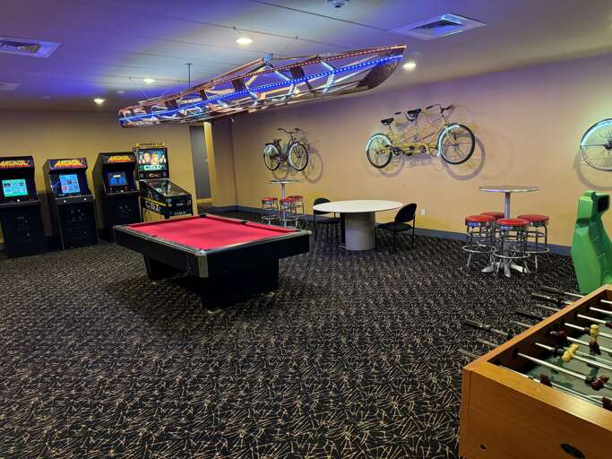 Game room with pool, foosball, arcade games, and a golf simulator!   Enjoy some quality time with your friends and family!