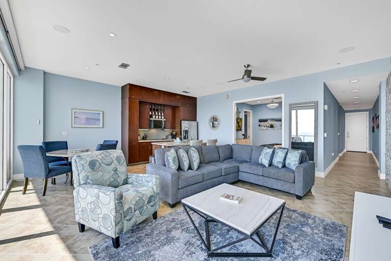 Recliner, sectional, pillows, dining area, bar, full kitchen, easy access to master