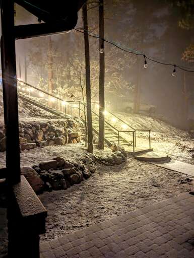 The stairs to the parking area above, enjoy the cold nights tucked in or on the deck.