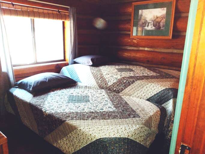 Guest room with both beds displayed