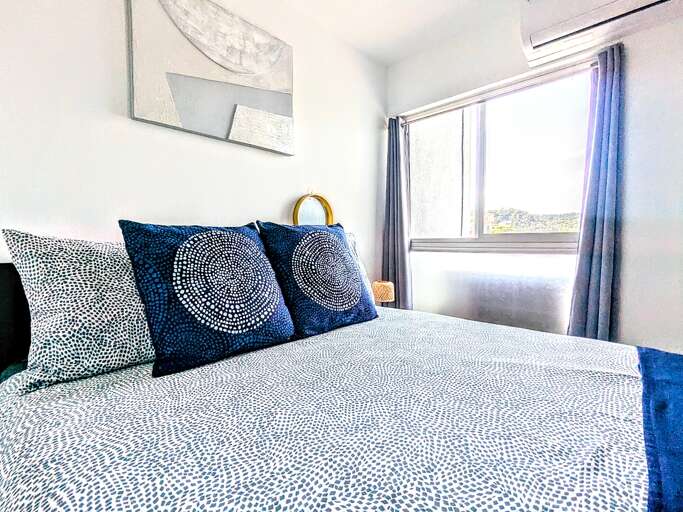 Guest bedroom with mountain views