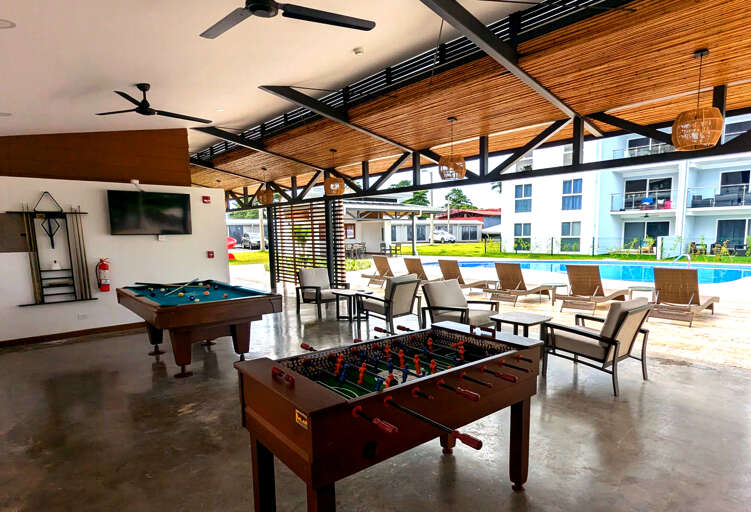 Game room with foosball and billiards 