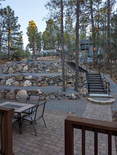 Cozy Cottage View of The Hillside Hangout and Front Yard Stairs.