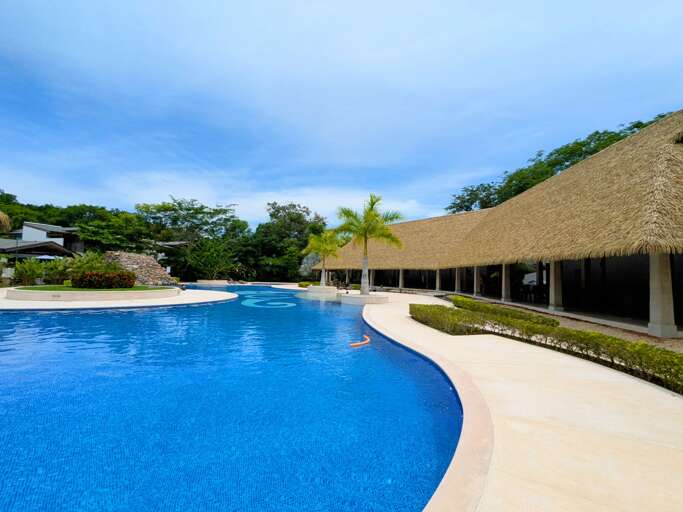 Large covered areas around the large community pool