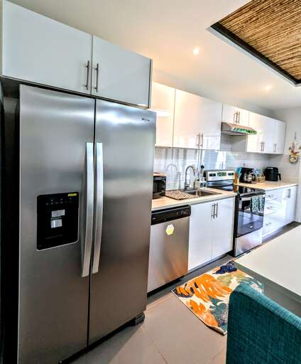 Large Fridge with Ice maker and fully stocked kitchen