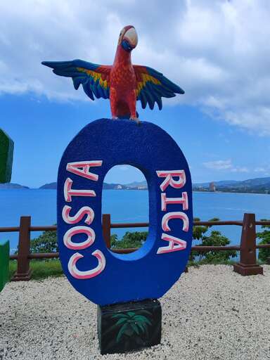 Jaco SIgn with View of Jaco