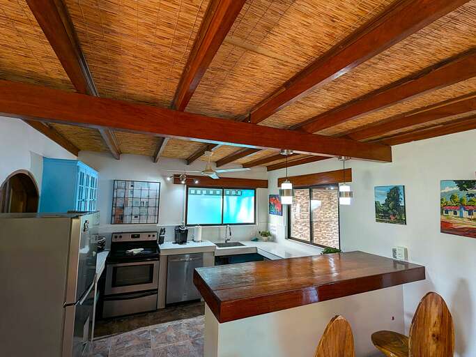 Shared kitchen and bar seating