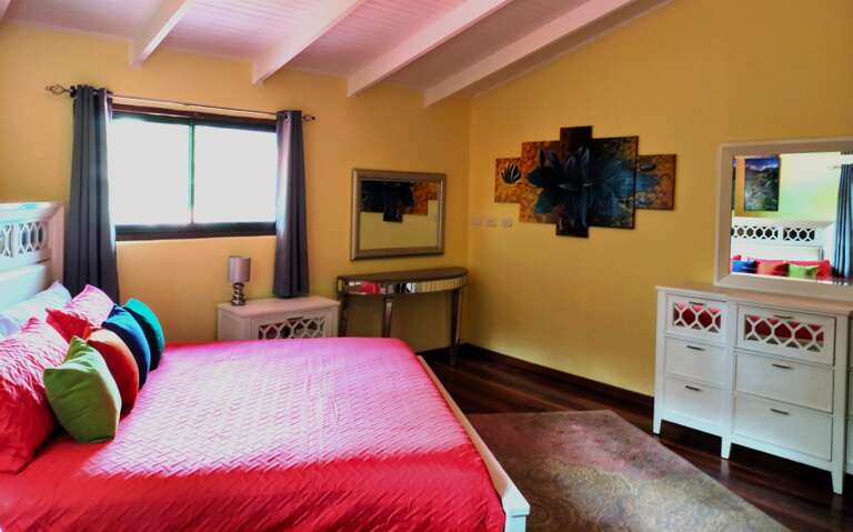 King Bed and Vanity In Sunflower Suite