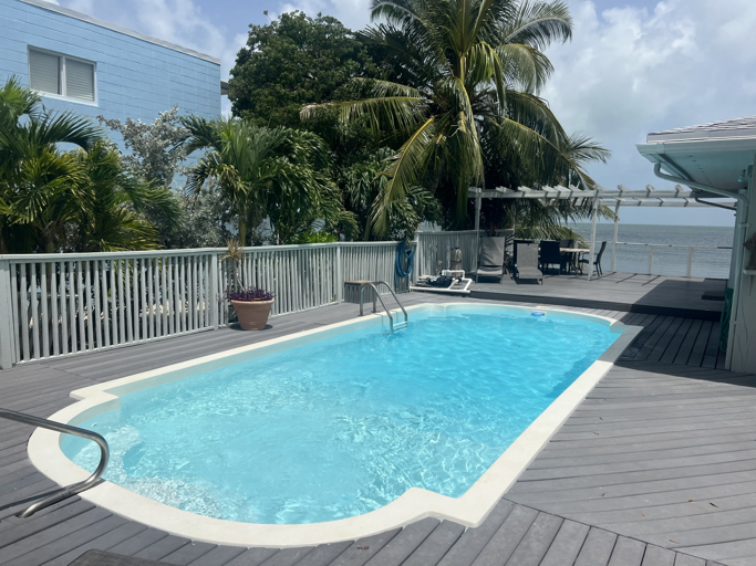 Enjoy your large private pool with stunning views of the Gulf, perfect for a refreshing swim or a relaxing afternoon