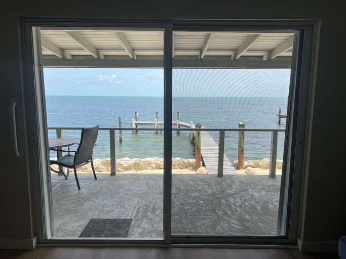 Stunning Gulf views right from the living area, with a sliding door that opens up to the patio