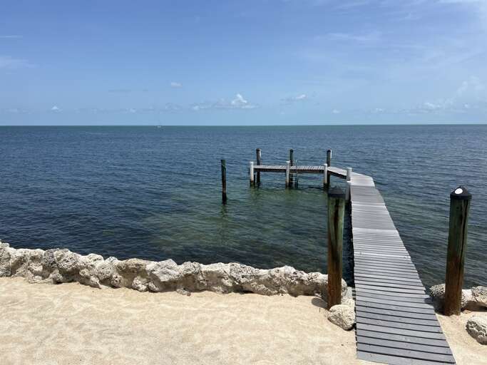 Private dock accommodates one boat, up to 26 feet in length