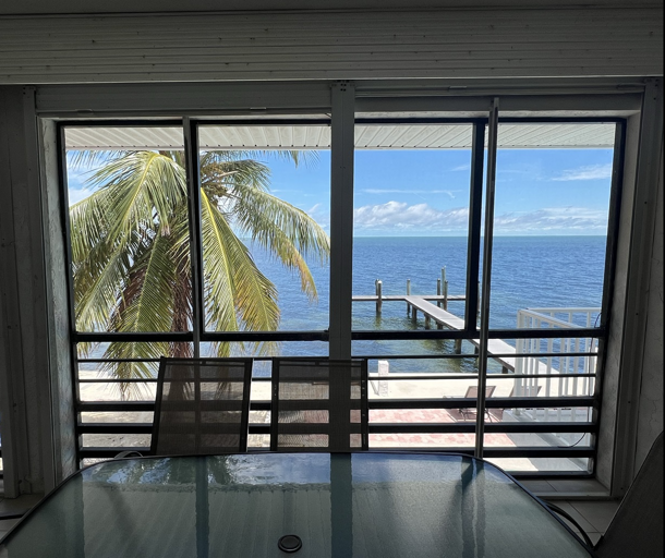 Screened-in porch – Enjoy Gulf views and al fresco dining in comfort