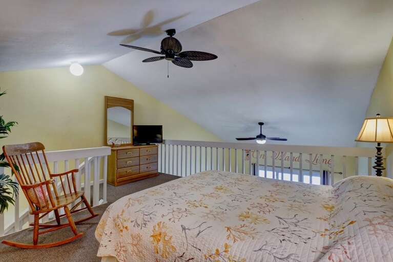 Loft bedroom with queen bed