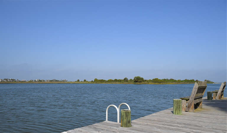 Beautful, fishing area with bench, and large covered pavillion in the Terramar neighborhood.
