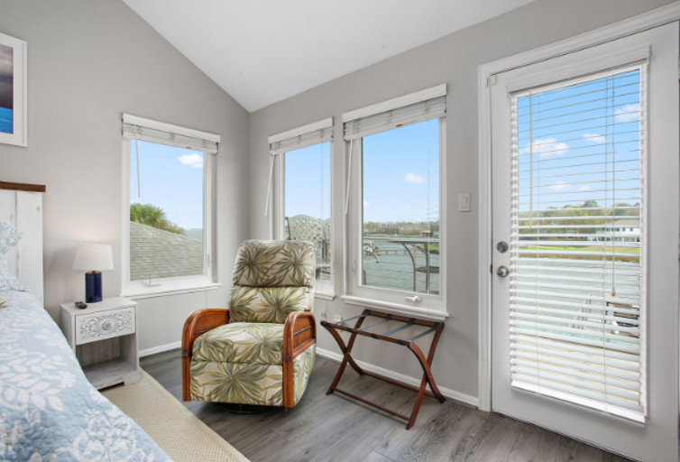 Seating for two on the private balcony overlooking the water. This view is from the master bedroom.