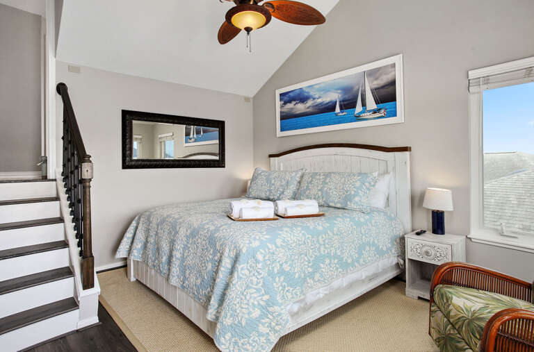 Streaming TV, ensuite bath,  and private balcony for two.  A few stairs up to the private, master bath.