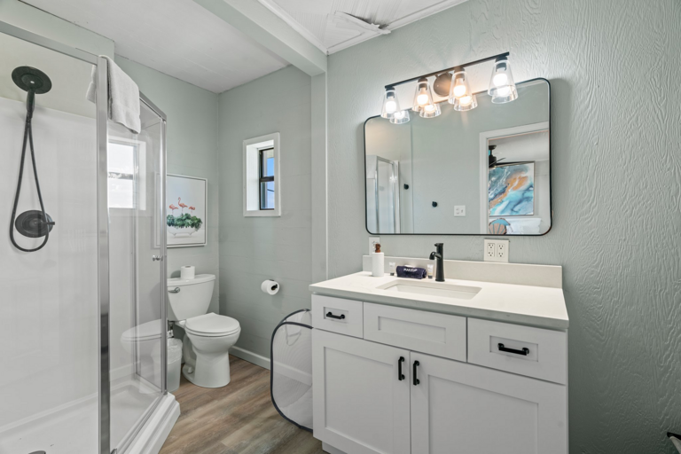 Polished Bathroom With Pristine Amenities In Vacation Rental