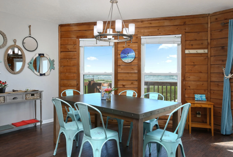 Enjoy the view, while you enjoy your meal!  Break out a board game after a fun day on the beach.